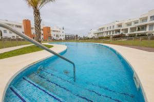 Swimmingpoolen hos eller tæt på Luxury Beach Townhouse Retreat + 9 billeder