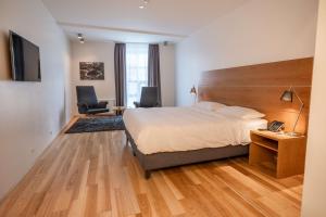 Ένα ή περισσότερα κρεβάτια σε δωμάτιο στο Park Inn by Radisson Reykjavik Keflavík Airport