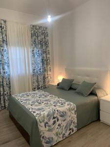 Ένα ή περισσότερα κρεβάτια σε δωμάτιο στο La casa de Cris +25 φωτογραφίες