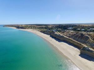 an aerial view of a beach and the ocean at Rose Villa - Port Willunga in Port Willunga