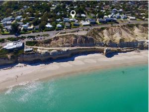 an aerial view of a beach and the ocean at Rose Villa - Port Willunga in Port Willunga