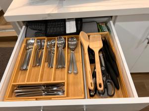 a drawer filled with utensils in a kitchen at 2 Bedroom 1 Parking Basement Unit in Richmond Hill