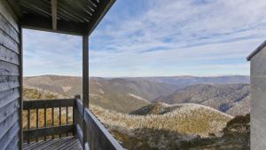 a view of the mountains from a house balcony at Shamrock 1 in Mount Hotham