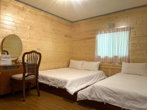 Letto o letti in una camera di Shitaoyuan