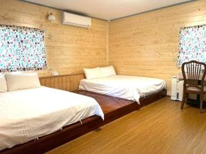 Letto o letti in una camera di Shitaoyuan
