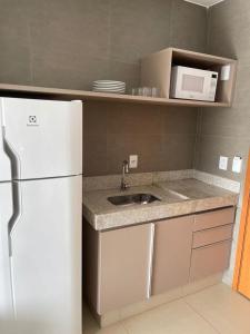 Køkken eller tekøkken på Lagoa ECO TOWERS ao lado do parque + 17 billeder