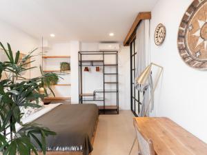 Ένα ή περισσότερα κρεβάτια σε δωμάτιο στο Tribeca Penthouse Canggu