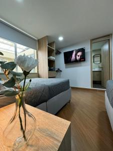 TV in/ali zabaviščno središče v nastanitvi Hostelfc Usaquen