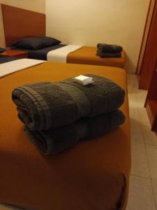 Postel nebo postele na pokoji v ubytování check in hotel