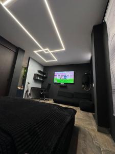 TV a/nebo společenská místnost v ubytování Bonito departamento en la ciudad