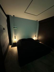 Postel nebo postele na pokoji v ubytování Bonito departamento en la ciudad + 1 fotografie