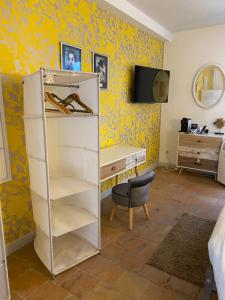 Un ou plusieurs lits dans un hébergement de l'établissement COUNTRY HOUSE La VILLAE