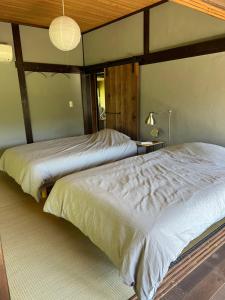 さんいんどう客房内的一张或多张床位