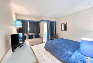 Katil atau katil-katil dalam bilik di T1 BIS RDC Carayou Marina Pointe du Bout