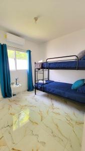 Postel nebo postele na pokoji v ubytování Casa Nueva Las Marías