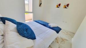 Postel nebo postele na pokoji v ubytování Casa Nueva Las Marías