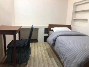 Postel nebo postele na pokoji v ubytování Samriddhi HomeStay