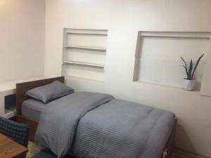 Postel nebo postele na pokoji v ubytování Samriddhi HomeStay