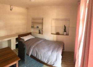 Postel nebo postele na pokoji v ubytování Samriddhi HomeStay