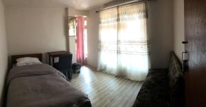 Postel nebo postele na pokoji v ubytování Samriddhi HomeStay