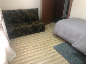 Postel nebo postele na pokoji v ubytování Samriddhi HomeStay