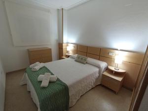 Postel nebo postele na pokoji v ubytování Torremar 34 + 30 fotografií