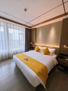 Guangzhou'daki Poltton International Apartment Guangzhou Panyu Political Affairs Center Branch tesisine ait fotoğraf galerisinden bir görsel