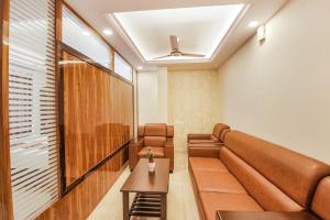Posezení v ubytování FabHotel SG5 Inn Suites-Yelahanka