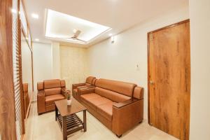 Posezení v ubytování FabHotel SG5 Inn Suites-Yelahanka