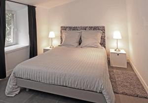 Postel nebo postele na pokoji v ubytování Gite du Grand Cerf