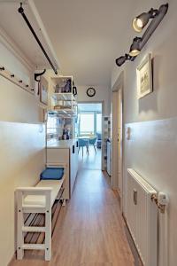 A kitchen or kitchenette at MOOKI Mountain & Pool Gerlitzen Apartment