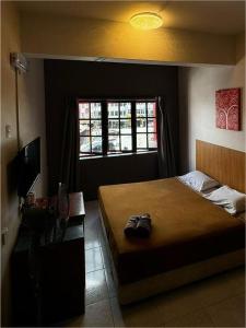 Postel nebo postele na pokoji v ubytování check in hotel