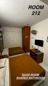 Postel nebo postele na pokoji v ubytování check in hotel