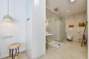 a bathroom with a shower and a toilet at MIMAR ALTEA ROOMS - Tranquil in Altea