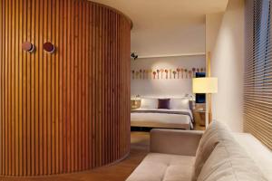 Uma cama ou camas num quarto em Hotel Madera Hong Kong