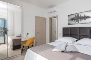 Posteľ alebo postele v izbe v ubytovaní Luxury Villa Dolce Vita, Sevid