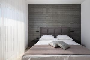 Posteľ alebo postele v izbe v ubytovaní Luxury Villa Dolce Vita, Sevid