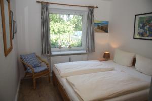 Postel nebo postele na pokoji v ubytování Haus Möösgraav + 39 fotografií