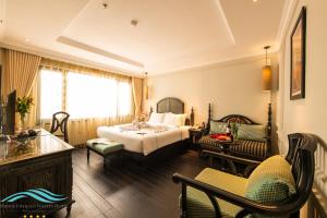 Voodi või voodid majutusasutuse Hanoi Emerald Waters Hotel Valley toas