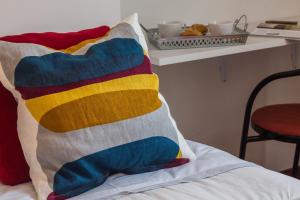 Dviaukštė lova arba lovos apgyvendinimo įstaigoje Zamboni Apartment