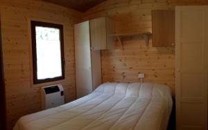 Postel nebo postele na pokoji v ubytování Camping Village Boscoblu'