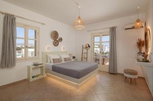 Posteľ alebo postele v izbe v ubytovaní Maria's Rooms & Studios