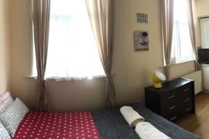 Postel nebo postele na pokoji v ubytování Studio 47B