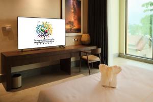 Postel nebo postele na pokoji v ubytování MonMonBoutique Hotel