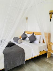 Postel nebo postele na pokoji v ubytování Idyll Cottage Ella