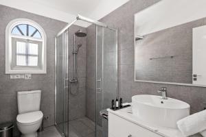 Koupelna v ubytování Adamante Luxury Villa by Nomads