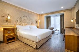 Postel nebo postele na pokoji v ubytování Barceló Cappadocia + 37 fotografií