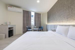 Voodi või voodid majutusasutuse hōo落雨 溫泉旅店 toas