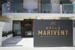 a sign in front of a building with aller management sign at Belle Marivent Boutique Hotel in Palma de Mallorca
