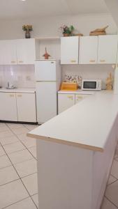 Kuchyň nebo kuchyňský kout v ubytování Bali Hai House